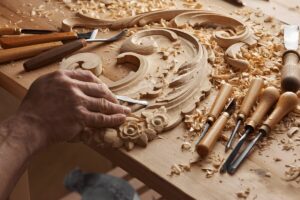 Traditional woodworking hand tools used to shape wood like hand plane and spoke shave