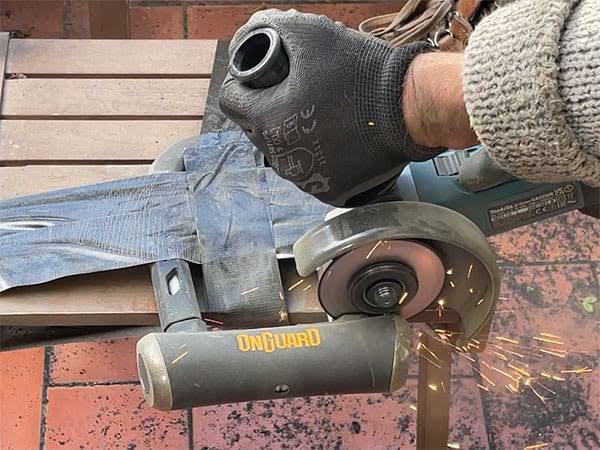 How to Cut an OnGuard Lock with a Rotary Tool Safely Rotary tool cutting through a hardened OnGuard bike lock secured to a metal bike rack