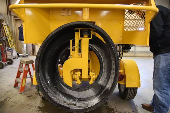 What Tool Is Used to Cut Tires? Best Options for Home & Shop Reciprocating saw cutting through a rubber tire with steel belts, showing sparks and protective gloves