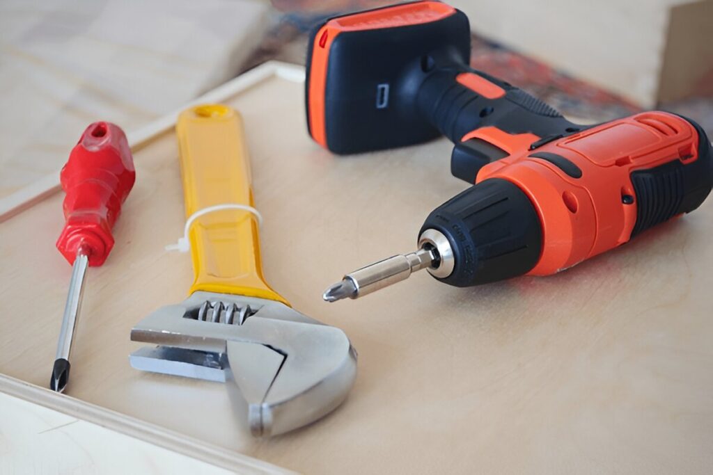 “Assorted hand tools neatly organized in a closed toolbox”
